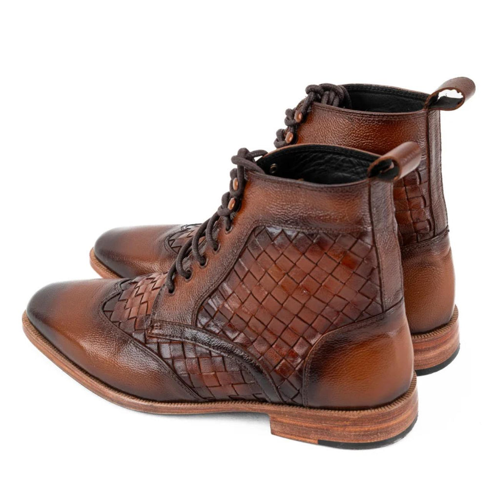 Black men's leather ankle boots with detailed woven leather pattern, pointed toe, lace-up closure, and contrasting wooden sole